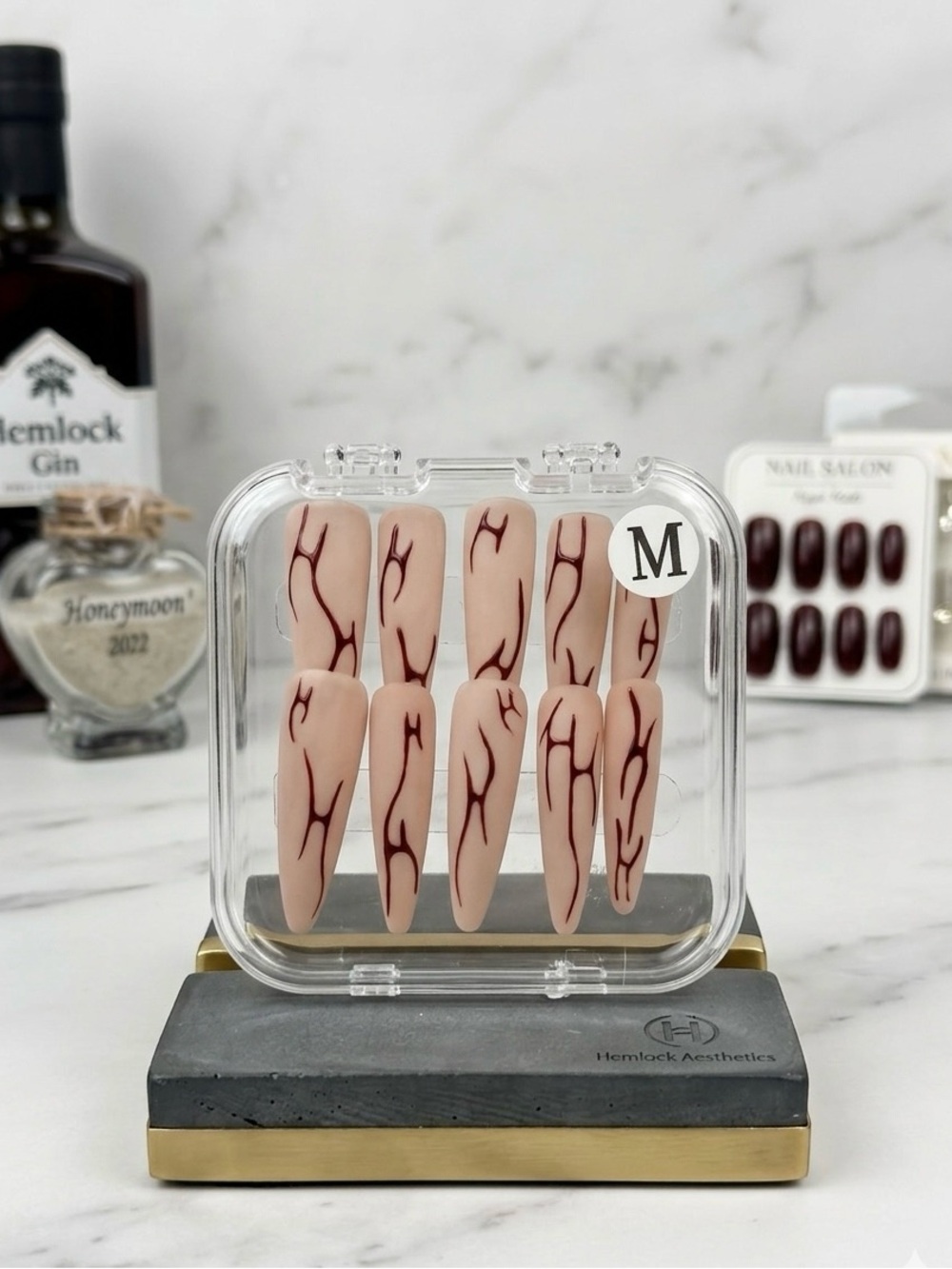 Nude Stiletto Press-On Nails with Red Vein Design